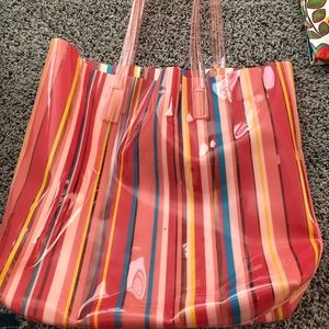 Clinique plastic shoulder bag. Water proof.